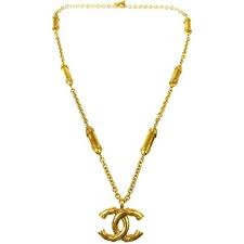 Preowned Chanel Vintage Gold Large Cc Charm Medallion Chain Long Drape 1 925 Liked O Vintage Gold Necklace Vintage Pendant Necklace Gold Charm Necklace