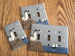 Over Sized Plastic Switchplate Covers Hand Painted With A Primitive Lighthouse Scene Soft Grey Light Switch Covers Switch Plate Covers Light Switch Covers Diy