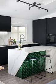 Today, kitchen designs are shifting away from the standard white or neutral space, and homeowners are embracing bolder, brighter colors instead. Modern Kitchen With Jewel Tones Modern Houses Interior Home Design Decor Contemporary Kitchen Design