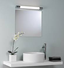 Picking the perfect bathroom vanity lighting is not as difficult as it may seem. Light Above Mirror Modern Bathroom Mirrors Bathroom Light Fixtures Modern Bathroom Light Fixtures
