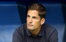 Mick McDermott insists Glentoran owner Ali Pour has no intentions of  leaving the club despite his move to Qatar