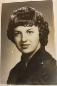 Vintage photo of mom in high school rifle club