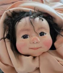 Creating dolls with needle felting technique