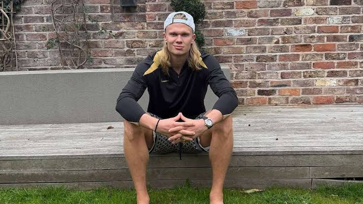 Erling Haaland with his iconic long blonde hairstyle