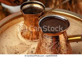 A small metal pot , usually of copper , with a long metal handle , used for preparing. Turkish Coffee In Cezve On The Sand Turkish Coffee Turk In Cezve On The Sand Canstock