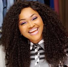 Weave hairstyles do not have to be a single color but can combine lowlights and highlights like this fantastic combination of blue hair color. 10 Best Nigerian Actress New Hairstyles New Natural Hairstyles