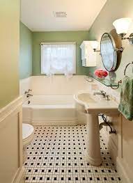 I love the juxtaposition with the white on orange polka dot wallpaper in the adjacent room. Pin By Be A Lucy On Bathrooms Classic Bathroom Tile Vintage Bathroom Tile Classic Bathroom