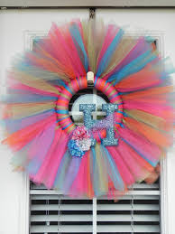 They're easy and inexpensive to create, and make a great addition to your. Tulle Wreath With Initial On It Tulle Wreath Diy Spring Wreath Homemade Wreaths