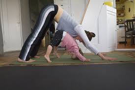 Keep your spine long and your skull on the floor without arching your neck or lower back. Pregnancy Wives Tales Say Your Yogi Toddler May Be Psychic Well Good