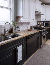 This kitchen jumps back into the modern farmhouse style featuring a large marble island and white marble countertops. Modern Farmhouse Galley Kitchen Minimal Black White Grey Subway Tiles Where With Elle