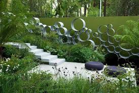 Andrew Sturgeon Steps To Patio Multible Silver Circle Art Work By Garden Wall Modern Garden Design Modern Landscape Design Landscape Design