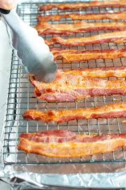 In fact, freezing bacon helps extend the shelf life of cooked bacon for the longest time. How To Cook Bacon In The Oven Oven Baked Bacon Evolving Table