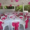 White folding chairs wedding reception. 3