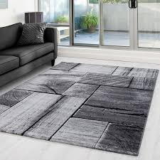 Diese teppiche bringen komfort in wohnzimmer, flur und außerdem: Moderner Designer Wohnzimmer Teppich Mit Holzmotiv Parma 9260 Schwarz Grau Grosse 80x150 Cm