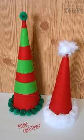 The christmas season is just around the corner where everybody is happy and trying to be as creative as possible. Diy Cardboard Santa Hats Santa Hat Crafts Christmas Crafts Diy Cardboard