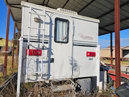 I am looking for a camper with shower inside and fits 6.5' bed Truck is 3/4  ton w/air bags, weight shouldn't be an issue.