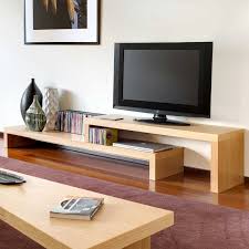 Even though it is simple in style, this wooden tv table is equipped with a large storage space, including additional glass, making it suitable for those who want to show off collections such as books or dolls in the. 16 Tv Stand Morden Styles Ideas Tv Stand Living Room Tv Tv Stand Designs