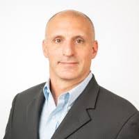 The Oak View Group Team showcasing some amazing Luau themed bites for  Orlando City's Gold Standard Celebration.