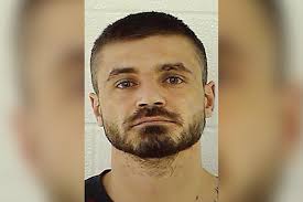 Ohio man sawed off adoptive mom's head, set her