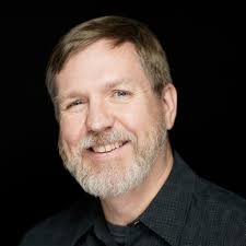 Dallas officer escorted by police processional to funeral home