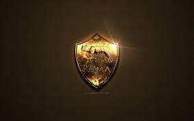 The bottom part of the shield features the word roma and year 1927 written. Download Wallpapers As Roma Golden Logo Italian Football Club Golden Emblem Rome Italy Serie A Golden Carbon Fiber Texture Football Roma Logo For Desktop Free Pictures For Desktop Free