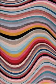 Décor in pink for the living room can give your home a fun and unexpected twist while keeping the backdrop distinctly neutral. Modern Swirl Pink Orange Red Bright Wool Rug By Paul Smith The Rug Company