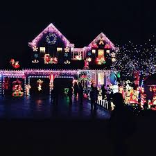 9 Amazing Tips To Hang Your Holiday Lights This Year Hanging Christmas Lights Holiday Lights Christmas Lights