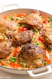 This one skillet easy arroz con pollo recipe is a spanish and latin favorite! Arroz Con Pollo Chicken Rice Noshtastic