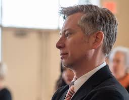 James Matthew Wilson Lights A Candle