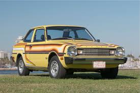 Image result for Bright Yellow 1977 Colt