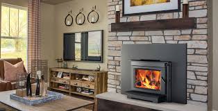 The cooking trivet deflects heat forward into the room while providing an attractive simmering spot. Napoleon S20i Wood Fireplace Insert Napoleon Wood Burning Fireplaces