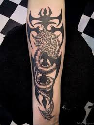 Fascinating expressive full sleeve tribal tattoo designs on men. 67 Great Dragon Tattoos On Arm