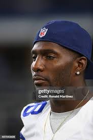 Clyde Gates of the Dallas Cowboys signals to the sidelines during a... News  Photo
