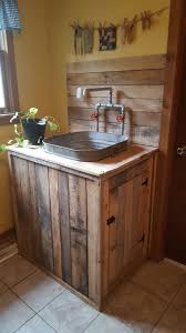 Utility Sink I Built From Pallet Wood And An Old Wash Tub Pallet Kitchen Cabinets Rustic Kitchen Cabinets Rustic Bathroom Designs