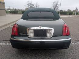 Image result for Charcoal Green 1999 Town Car