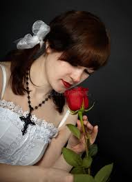 Beautiful Young Woman Smells Rose Flower Stock Photos