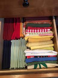 Learn about the konmari method, the japanese art of decluttering and organizing. My Kitchen Towels And Cloth Napkins Organized The Konmarie Method Beautiful Konmari Method Organizing Kitchen Drawing Marie Kondo Folding Towels