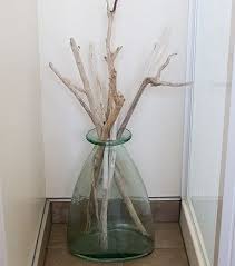 Ce vase n'est plus étanche pour y placer des fleurs fraîches. Des Branches De Bois Dans La Decoration Des Exemples Trouves Sur Pinterest Driftwood Decor Beach House Decor Coastal Decor