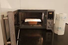 This functional hand towel has two layers so it can be slipped over your towel bar/hanger or oven door. Can You Dry Clothes In The Microwave Microwave A Towel Tips