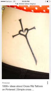 Cross with flowers inside tattoo. 19 Pretty Cross Heart Tattoo Design Ideas Entertainmentmesh