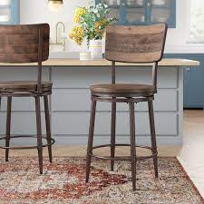 These are some of our favorite bar stools because they are the perfect mix of modern, rustic, vintage, and chic. Stephan Swivel Bar Counter Stool Reviews Joss Main Come Unassembled Could Paint Bef Rustic Bar Stools Bar Stools Kitchen Island Farmhouse Bar Stools