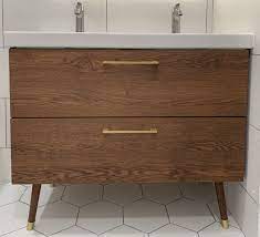 Apr 01, 2021 · the ikea godmorgon / bråviken double vanity (2 drawers) embraces a clean and minimal design to be easily combined with other bathroom furniture. Godmorgon Vanity Hack Added Mid Century Modern Table Legs And Brass Leg Caps Spray Painted The Handl Godmorgon Vanity Ikea Bathroom Vanity Laundry In Bathroom