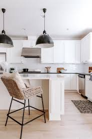 K Peterson Design Rose Hill Kitchen Remodel White Kitchen Black Pendants White Kitchen Design White Kitchen Black Kitchen Countertops