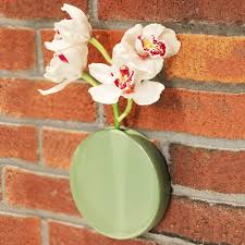 There is an eye hole on the back of the vase to hang it. Round Ceramic Wall Mounting Vase Chive Wall Dots Grey Home Garden Home Decor