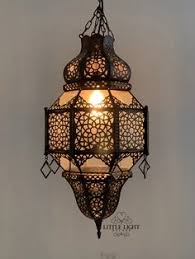 Our moroccan pendant lighting is sculpted of iron in classic mediterranean shapes and meticulously hand pierced with flowing designs that glow as the light shines through. 89 Moroccan Lighting Ideas In 2021 Moroccan Lighting Moroccan Lamp Moroccan Lanterns