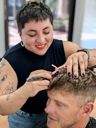 Hi all ! My name is Julie and I am a barber located inside men's corner ! I  am running a special for $15 back to school cuts ! Besides helping get