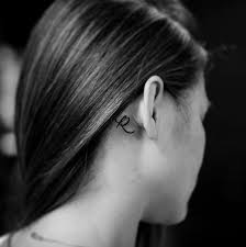 Tattoos behind the ears look cute. 11 Tiny Tattoo Ideas For Behind Your Ear From Celebrity Tattoo Artists Glamour