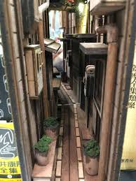 Creative Bookends By Japanese Artist That You Have To See From Up Close To Really Appreciate Wooden Bookends Bookends Book Nooks