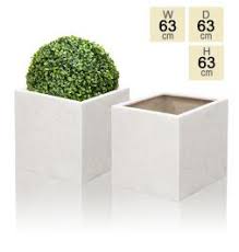 Low and sleek, the cube planter is the perfect addition to any balcony, deck, or patio. Square Cube Planters 265 From 18 99