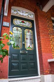 The traditionally crafted doors come in variety of styles, including single doors, doors pair and glazed doors. Ornate Edwardian Front Door With Stained Glass Cotswood Doors